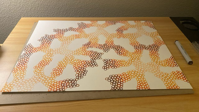 Wide shot of my latest drawing composed of lots of blobby circles connected to form a fractal like network using a palette of oranges and browns