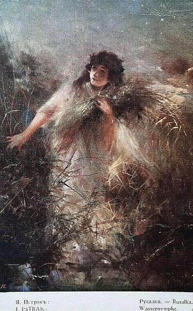 Depiction of a rusalka walking into the water. 
Original artwork: J. Pstrak (1914)
