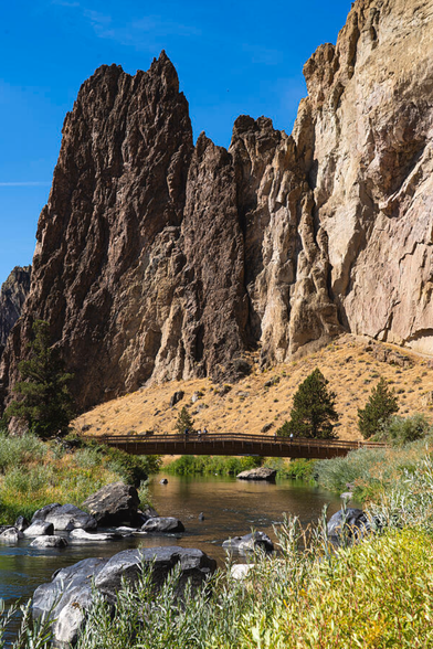 Bridge Over the River Smith Rock State Park Bend Oregon

Smith Rock is truly one of Oregon’s crown jewels, renowned worldwide as a premier destination for rock climbing. Towering volcanic rock spires pierce the sky, casting dramatic shadows across the winding Crooked River below. Whether you're hiking the steep and iconic Misery Ridge Trail, enjoying a gentle stroll along the River Trail, or simply soaking in the views from the top of the canyon rim, every angle of this park is a photographer’s dream and a nature lover’s delight.

The high desert climate gives the landscape a unique golden glow, especially in the early morning or golden hour light, when the rugged textures of the cliffs come alive. Wildlife such as golden eagles, mule deer, and river otters are often spotted in and around the park, adding a touch of wild wonder to the already stunning environment.


Image:
https://fineartamerica.com/featured/bridge-over-the-river-smith-rock-state-park-bend-oregon-wayne-moran.html

read more:
https://waynemoranphotography.com/blog/pacific-northwest-photography-adventure-a-journey-through-natures-masterpieces/

#SmithRock #StatePark #Bend #Oregon #river #Bridge #hiking #Landscape #photography #travel #travelphotography

#AYearForArt #buyintoArt