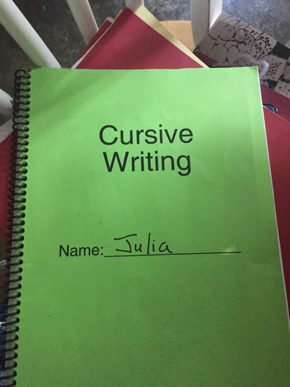 School workbook—Cursive Writing Name: Julia