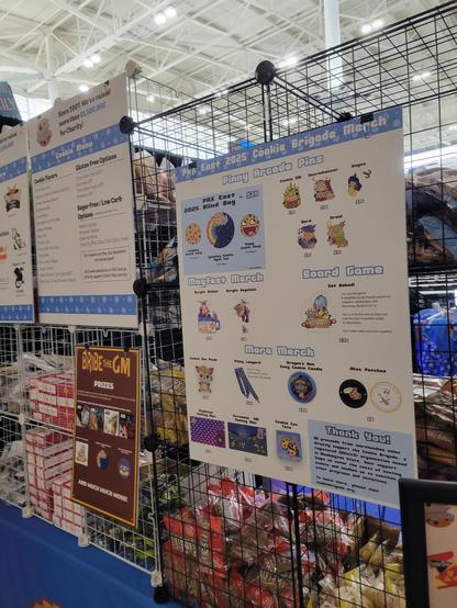 a Cookie Brigade merch menu and vending rack.