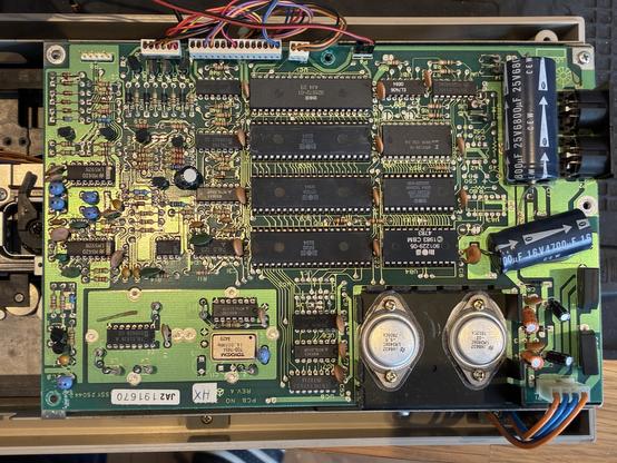 A green PCB of a 1541 floppy drive. I can’t spoil what’s wrong. But if you don’t know these things inside out you should compare with a know good board.