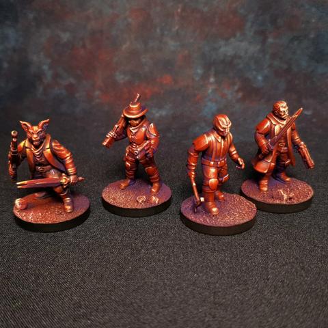 A set of 4 painted miniatures in red of sci-fi wild west style minis.