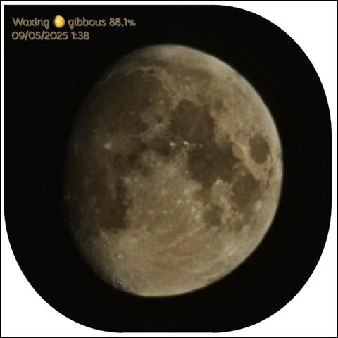 The image shows a close-up view of the Moon, captured on 09/05/2025 at 1:38. The Moon is in a waxing gibbous phase, with 88.1% of its surface illuminated. The surface features visible include craters and maria, with a predominantly grayish-brown coloration. The background is a solid black, emphasizing the Moon's details. The image has a rounded square shape, with text in the upper left corner reading "Waxing 🌔 gibbous 88.1% 09/05/2025 1:38."