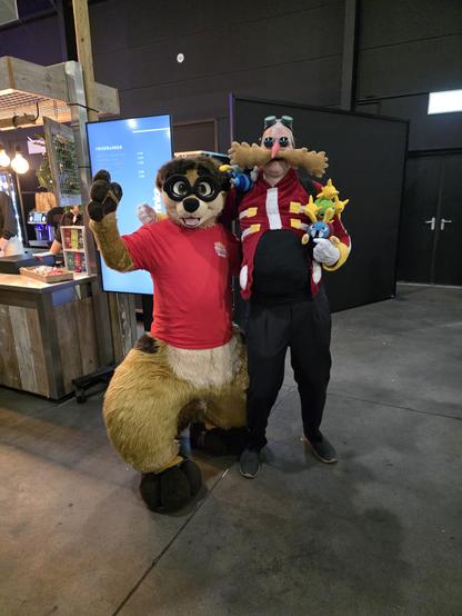 A meerkat fursuit together with Dr. Robotnik cosplayer