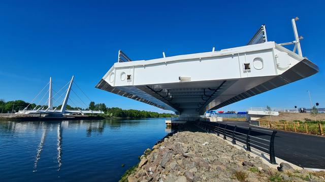 A new vehicular swing bridge lies open, waiting to be finally brought into use.