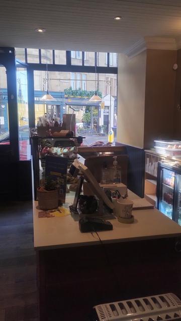 Looking along the counter if the French patisserie to the front window