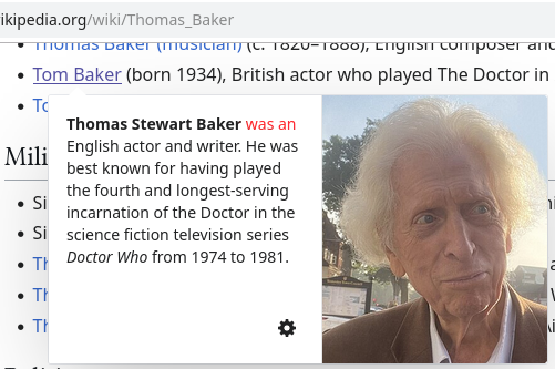 Part of a Wikipedia website screenshot showing a popup/layer window reading »Thomas Stewart Baker was an English actor …«