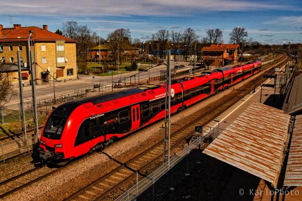 A red train with the text "Trainy McTrainface" on the side.