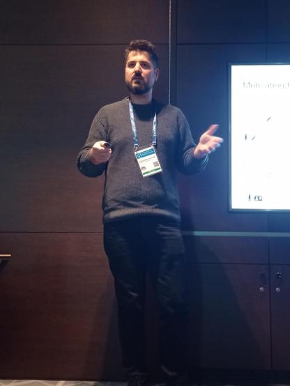 Harry himself presenting. No mike! He has a great voice