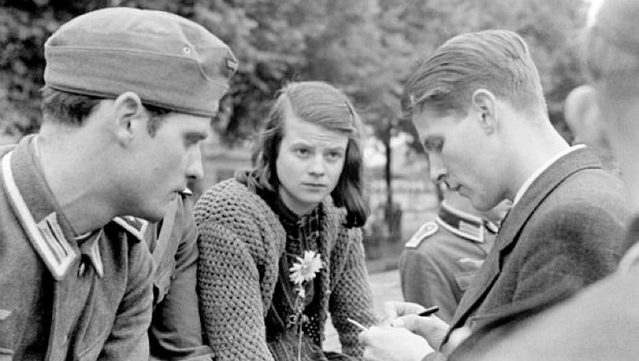 Photo of Hans Scholl (in German Army uniform), Sophie Scholl and Christoph Probst, leaders of the White Rose resistance organization. Photo taken in Munich, 1942.