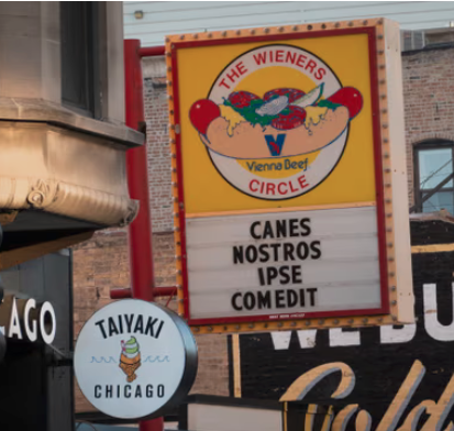 Hot dog store in Chicago: CANES NOSTROS IPSE COMEDIT (latin) on the sign)