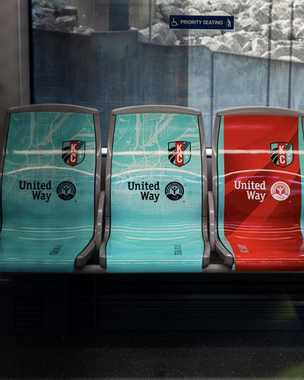 Photo of the inside of the streetcar with the seats wrapped as our Heartland and Teal Town kits