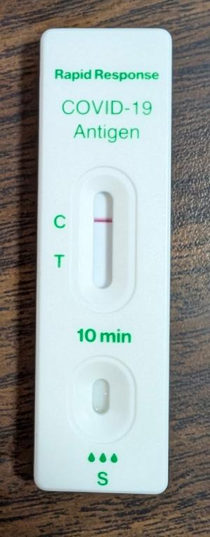 My photo of my negative COVID-19 Antigen test.