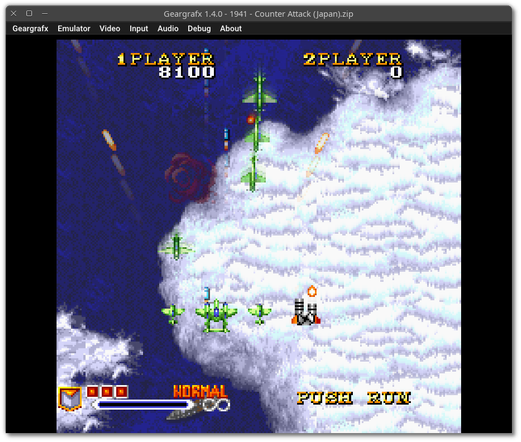 🕶️ A view of its UI (version 1.4.0, dark theme, under Linux) with the game “1941 Counter Attack”, an arcade classic, a shooter in which the player pilots a plane and battles tons of other planes during WW2. The screenshot does not reflect the quality of the realization, as the image is taken in motion, with the inherent blur. The emulator menus are displayed at the top, while the rest of the screen is devoted to the game in progress.

📚️ Geargrafx is a libre, multi-platform NEC TurboGrafx-16 (PC Engine) & Supergrafx consoles emulator. It has an interface or can be run from the command line, and features HLE BIOS support (no need for an external BIOS), drag-and-drop content, compressed content, state saving, modern controllers, automatic game/sound interruption on loss of focus. It also offers a full debugger (with just-in-time disassembler, CPU breakpoints, memory access breakpoints, code navigation, debugging symbols, automatic labels, memory editor, PSG inspector and video viewer including registers, tiles, sprites and backgrounds). A very good emulator.