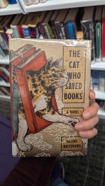 A library book: The Cat Who Saved Books by Sosuke Natsukawa
