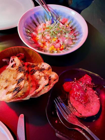 table set in low light with Argentinian food