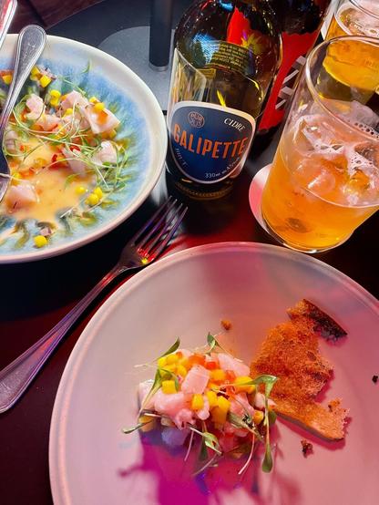 table set in low light with Argentinian food