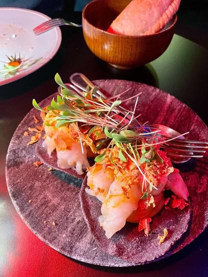 table set in low light with Argentinian food