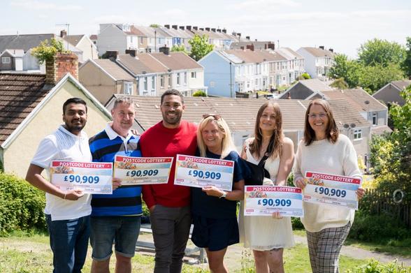 Neighbours (L-R) Dimuthu, Alan, Tracey, Gemma, Kay-Marie with lottery's Danyl Johnson (3rd left)