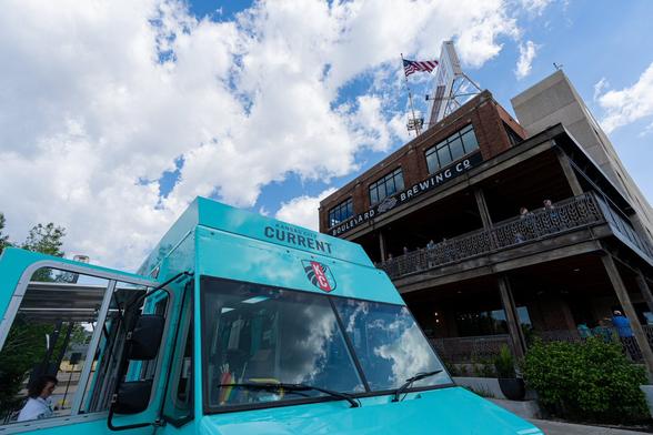 Close up of the Teal Mobile outside of Boulevard Brewing Company