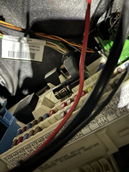 A 10 millimeter socket hiding in a fuse box
