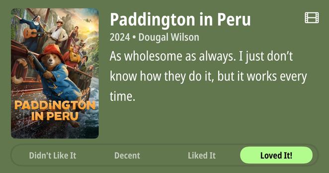 Movie poster for "Paddington in Peru" (2024) directed by Dougal Wilson. The animated bear Paddington is in the foreground wearing his iconic blue coat and red hat while riding in a boat on turbulent waters. Behind him are several human characters including a nun with a guitar and a man in explorer-style clothing. The background shows dramatic Peruvian mountains and waterfalls. Green review text states: "As wholesome as always. I just don't know how they do it, but it works every time." At the bottom are rating options: "Didn't Like It," "Decent," "Liked It," and "Loved It!" with "Loved It!" highlighted.