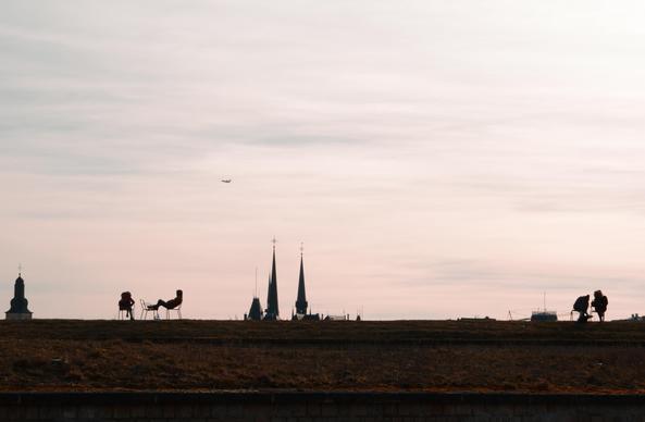 Church goers or people simply resting outside a church
