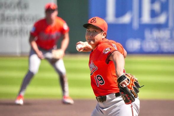 Tomoyuki Sugano finishes a strong spring with the Orioles on the mound — and the golf course