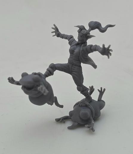 A gremlin type creature with frogs tied to their feet because that's how you run faster.