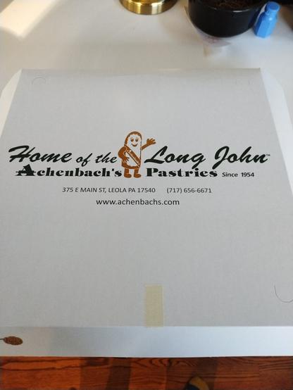 A pastry box from a local bakery called Achenbach's.  They're well known in the area for their "long John" pastries.