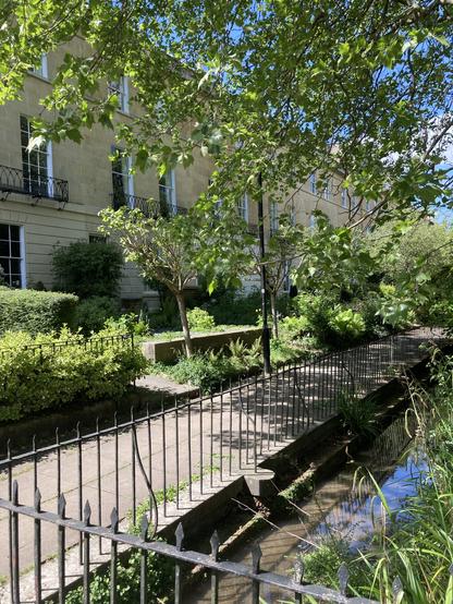 The Lyn Brook flows in front of these Georgian-era row houses.