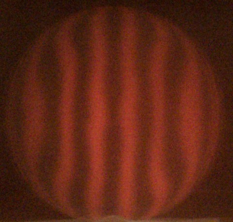 My mirror on may 7, showing an oblate spheroid: the center is flat, while there is a dip in the mirror surface at around 70% of the way from the center to the edge.