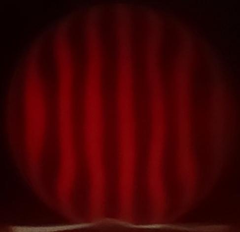 Mirror after a bit of parabolizing W strokes. The lines look like they're bulging outwards, a sign of a developing central hole. The zone at 80% diameter is still curved inwards.