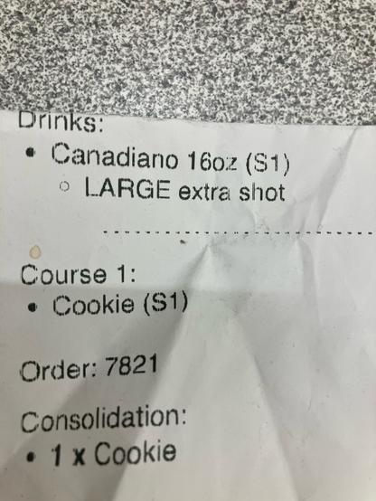 A receipt showing a beverage called a Canadiano.