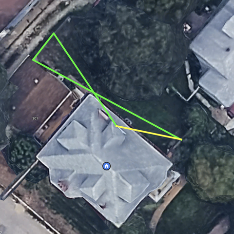 A satellite photo of my house with the path of the antenna shown in green, counterpoise in yellow.