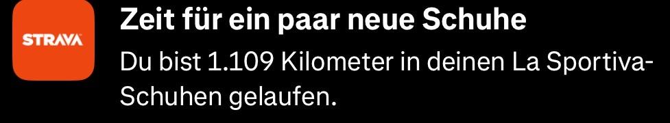 A screen displaying a message from the Strava app. It states, "Time for a new pair of shoes" and notes that the user has run 1,109 kilometers in their La Sportiva shoes.