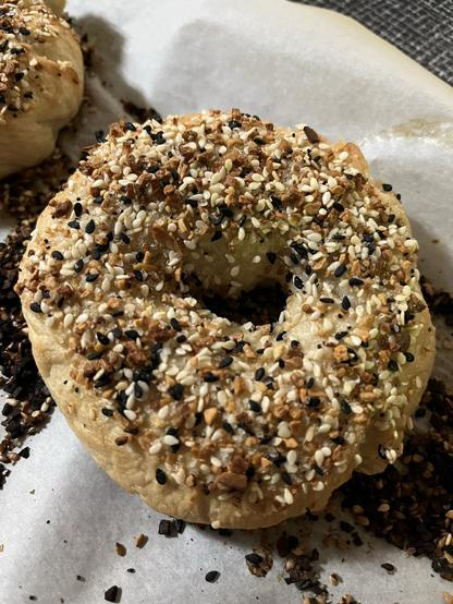 Up close photo of fresh baked everything bagel