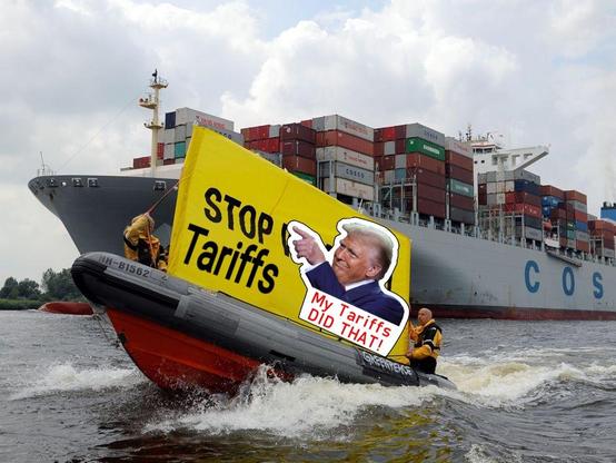 A boat with a banner saying  "Stop the Tariffs!" sails alongside an empty Chinese ship.