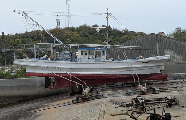 Boat being cleaned (and out of the water) in Ogijima fishing port.