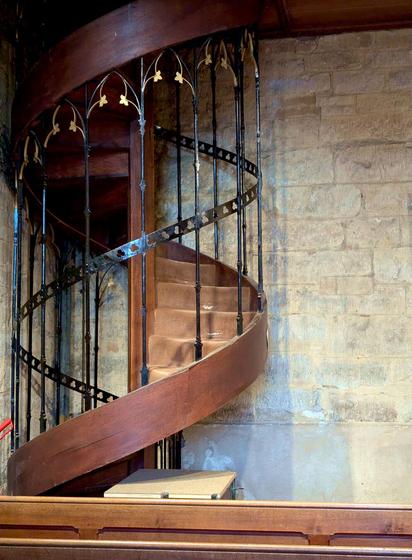 Staircase to the church organ. Sherborne Abbey, Sherborne, Dorset, England. May 2025.