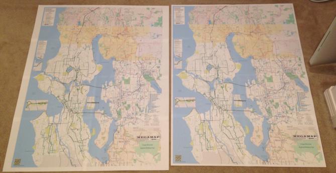 two glued-together megamap 1.7 bike maps covering the greater Lake Washington area (including Seattle). they're each the size of a large poster. one is trimmed the other isn't yet.