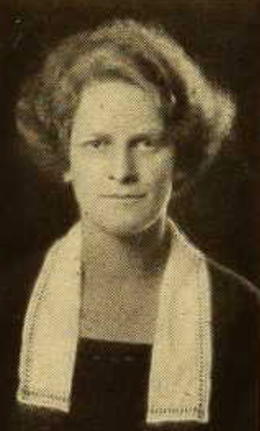 Marion Bacon, from the 1922 yearbook of Vassar College; a young white woman with light hair in a wavy bouffant style; wearing a dark dress with a white collar