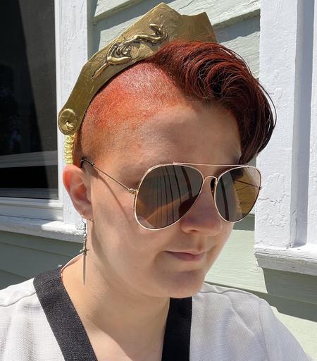 closer selfie of me in the same outfit, accessories more visible.