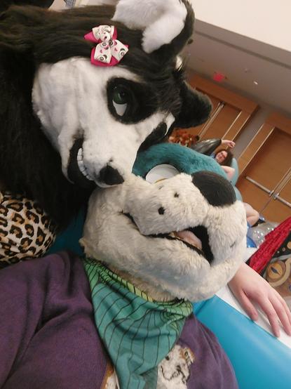 Me in my partial suit again with my husband in his teal otter partial