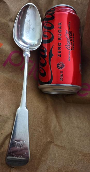 It's BIG! It is huge compared to a Coke can!