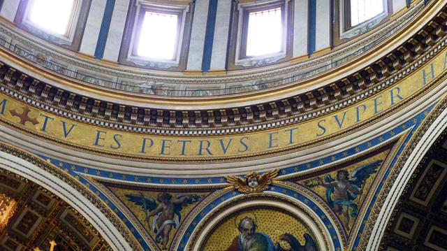part of the dome, a mosaic of John the Evangelist, and the famous words: tu es Petrus