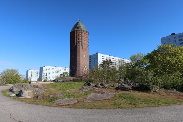 The old water tower in Hagalund, Solna, Sweden.
Red brick tower.