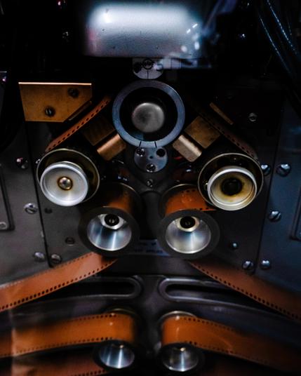 Tape handling sprockets of a film based tape drive.