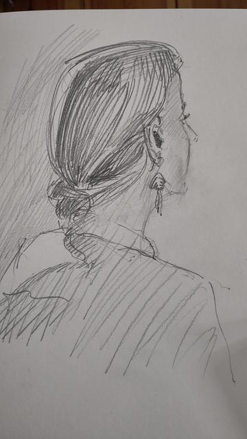 Graphite sketch of a woman seen from the back. She wears a low braid and a earring